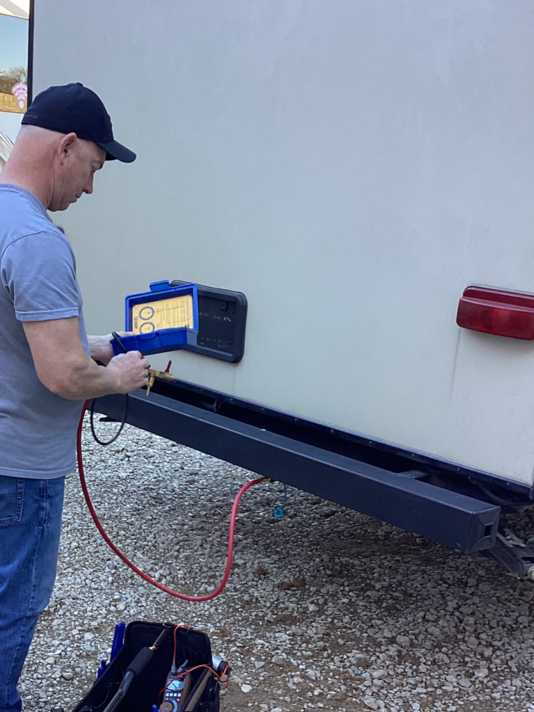 Clay Buckley performing mobile RV repair on-site